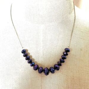 Purple floating beads necklace